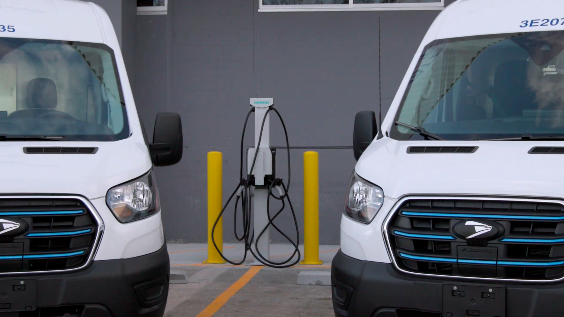 Check out the new electric postal vans and charging stations