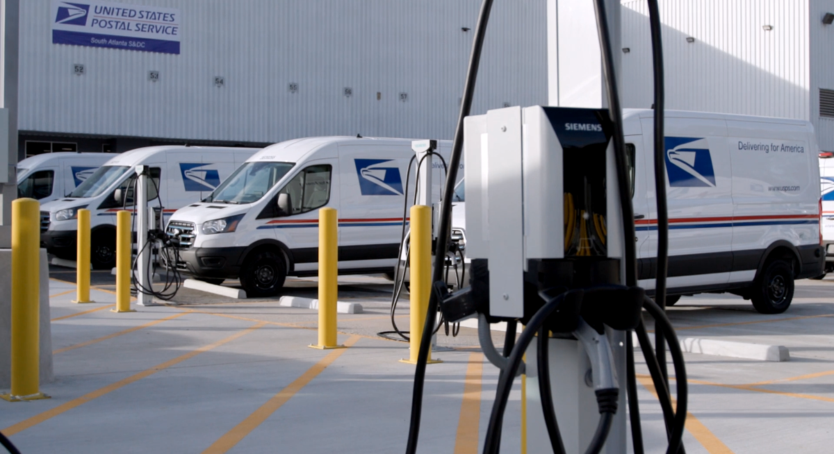 Check out the new electric postal vans and charging stations